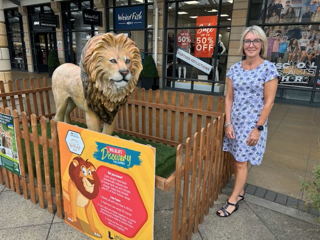 Abby Chandler, Deputy Centre Manager at Lakeside with fake Lion